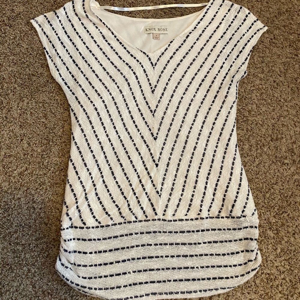 White and black top.